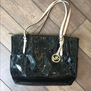 Michael Kors Bags - Authentic MK purse. Black and Tan. Michael Kors Bags - Authentic MK purse. Black and Tan.